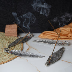 Leaf incense holder with elephant figurine