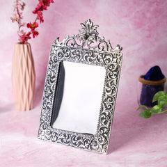 Photo frame with flower on top