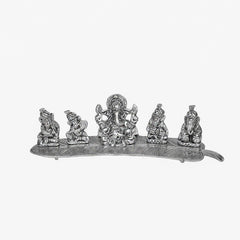 Instrument playing 5 ganesha idol on a leaf