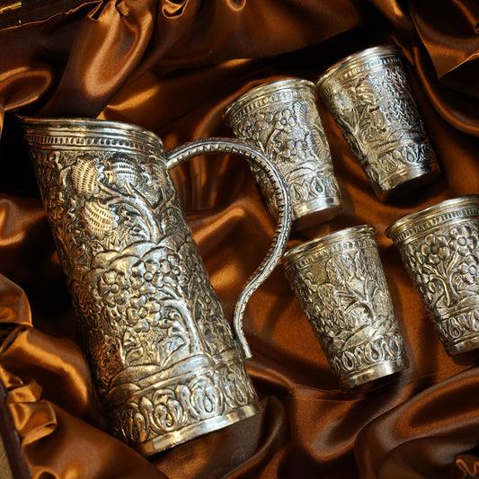 ONE DESIGNER JUG WITH 4 GLASSES