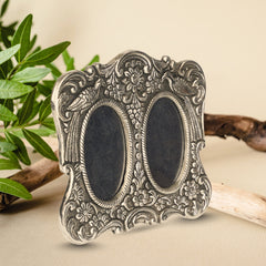 Photo frame with peacock design carving