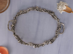 METAL AND FIBRE OVAL TRAY WITH ROSE CARVING
