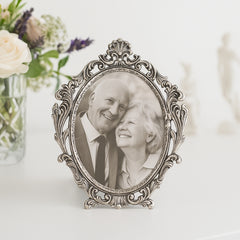 FINE CARVED OVAL PHOTO FRAME