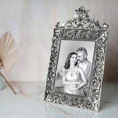 Photo frame with flower on top