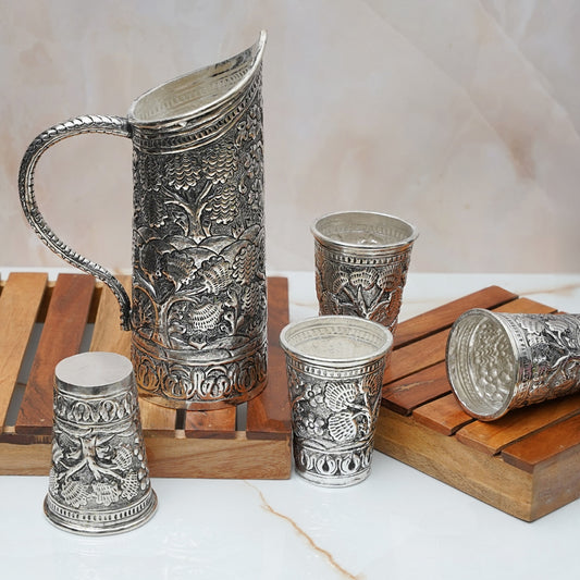 ONE DESIGNER JUG WITH 4 GLASSES