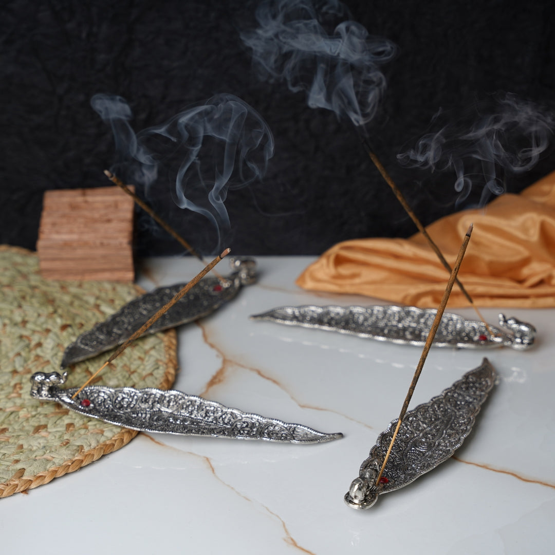 Leaf incense holder with elephant figurine