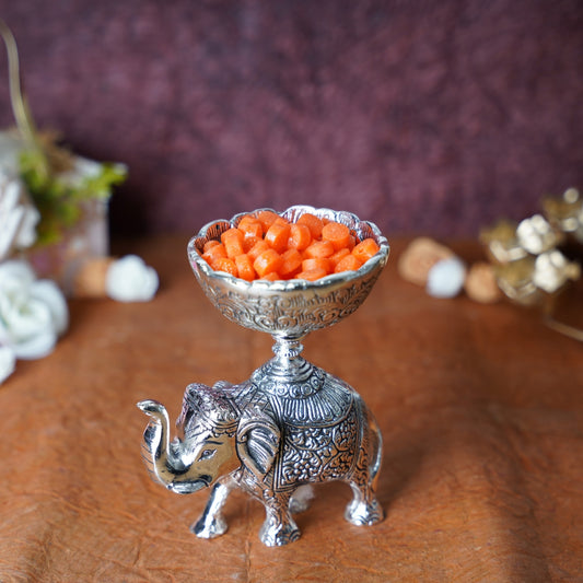 ELEPHANT WITH BOWL ON TOP