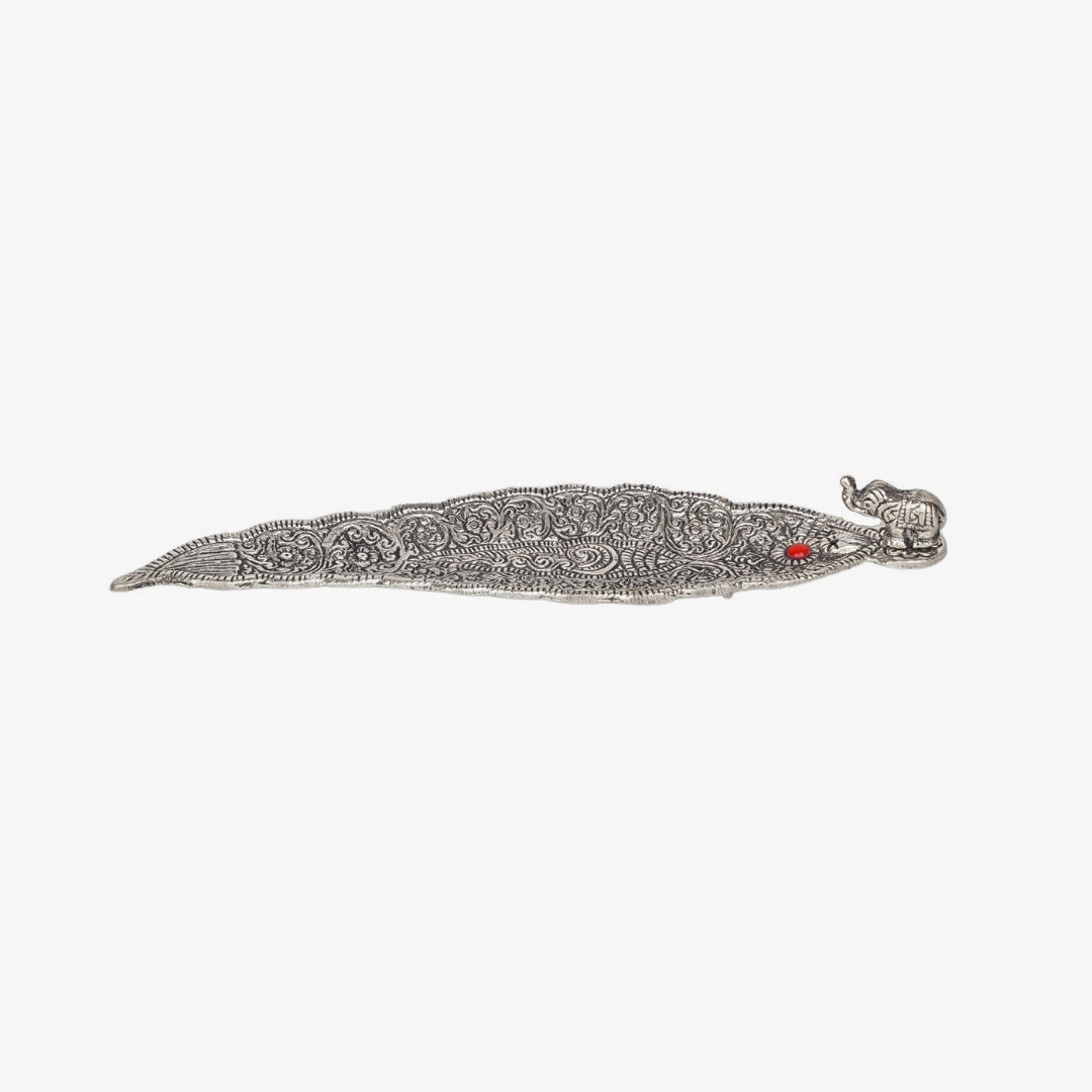 Leaf incense holder with elephant figurine