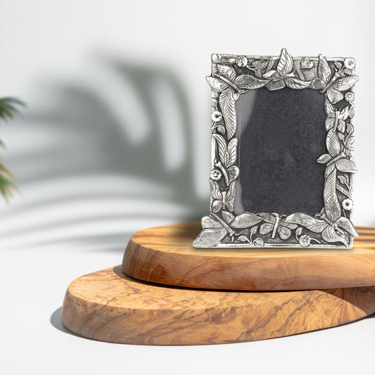 Photo frame with butterfly design carving