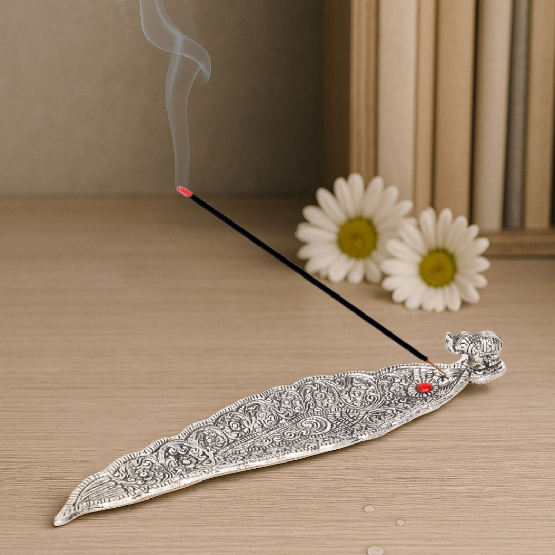 Leaf incense holder with elephant figurine