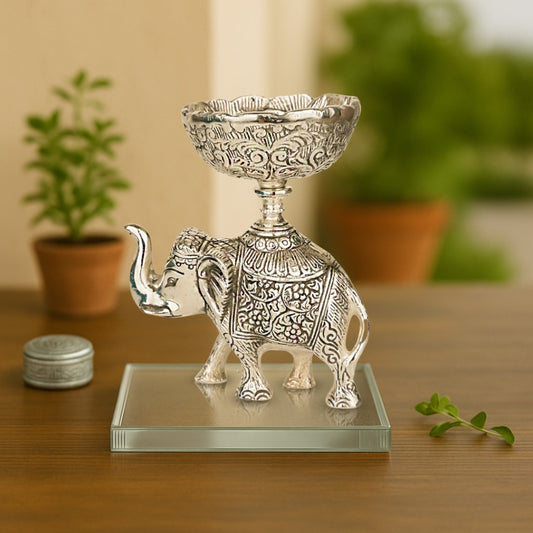 ELEPHANT WITH BOWL ON TOP
