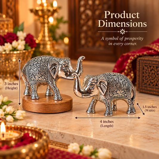 Two ornate silver elephant figurines on a marble surface with overlaid dimension labels showing 4 inches length, 1.5 inches width, and 3 inches height.