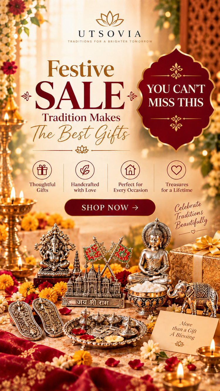 A festive promotional banner for Utsovia featuring a collection of traditional Indian decorative items including a seated Buddha statue, Ganesha idol, miniature temple, mace, elephant figurine, and a pair of silver mule shoes. The scene is decorated with marigold flowers, lit candles, and gold-toned ornaments on a draped red fabric surface.