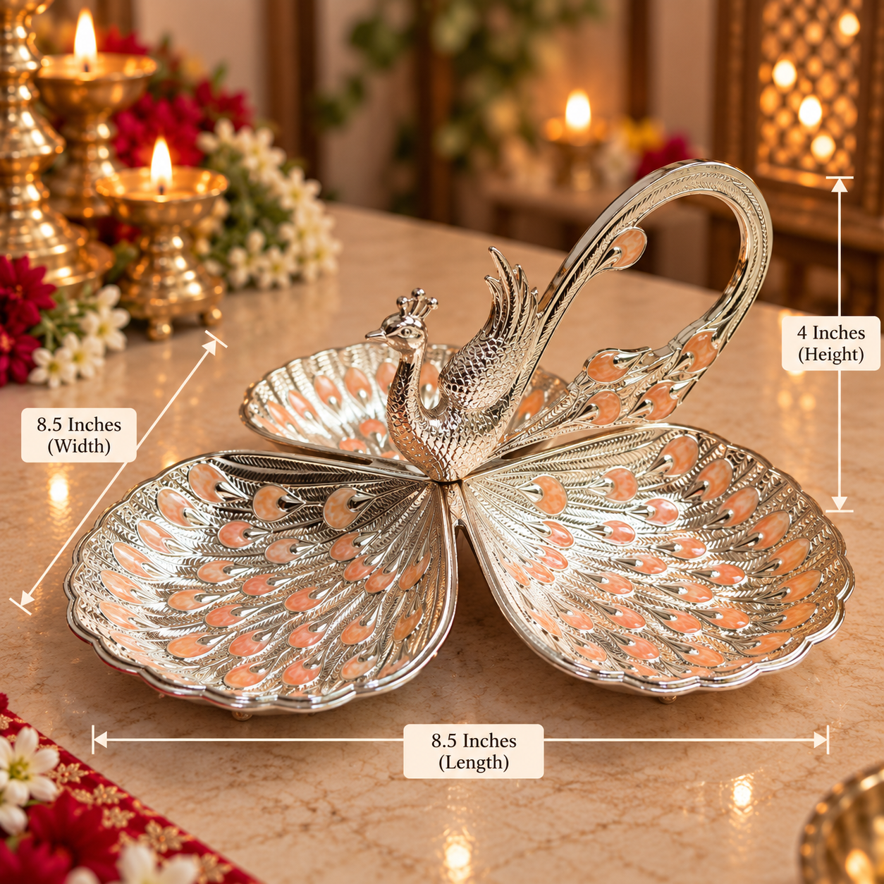 A decorative metallic peacock-shaped dish with open wings and a curved handle, shown on a tabletop with overlaid dimension labels indicating 8.5 inches width, 8.