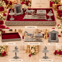 A coordinated wedding keepsake set displayed in a velvet-lined decorative tray, with six labeled close-up panels showing the contents: a complete set, the velvet tray, a horse cart box, a photo frame, and two decorative diya holders. The pieces are ornate silver-toned metal with red velvet interior and floral detailing, surrounded by roses and candles.