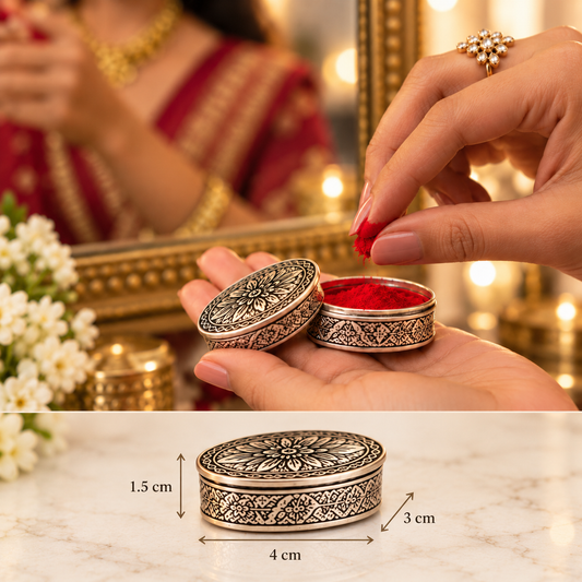 An ornate silver-toned round box with engraved floral detailing, shown open with red powder inside, alongside a bottom panel showing the box dimensions as 4 cm by 3 cm by 1.5 cm.