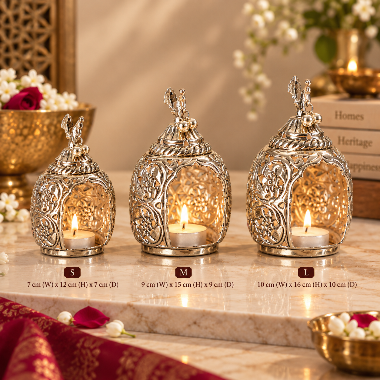 Three ornate silver metal lantern candle holders with rabbit perched on the lids are arranged on a marble surface. Each lantern contains a lit tealight candle, and size labels S, M, and L with dimensions are overlaid near the bottom.